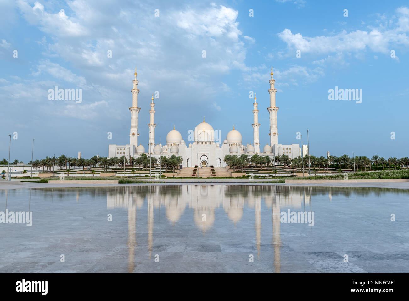 Abu Dhabi, United Arab Emirates. 17, May, 2018.  Sunrise at Sheikh Zayed Grand Mosque in Abu Dhabi, capital city of the United Arab Emirates, on the first day of Ramadan 2018  Mosque is made of white Italian marble and is also home to the final resting place of the Founding Father of the UAE, Zayed bin Sultan Al Nahyan  ©2018 Richard Sharrocks  / Alamy Live News Stock Photo