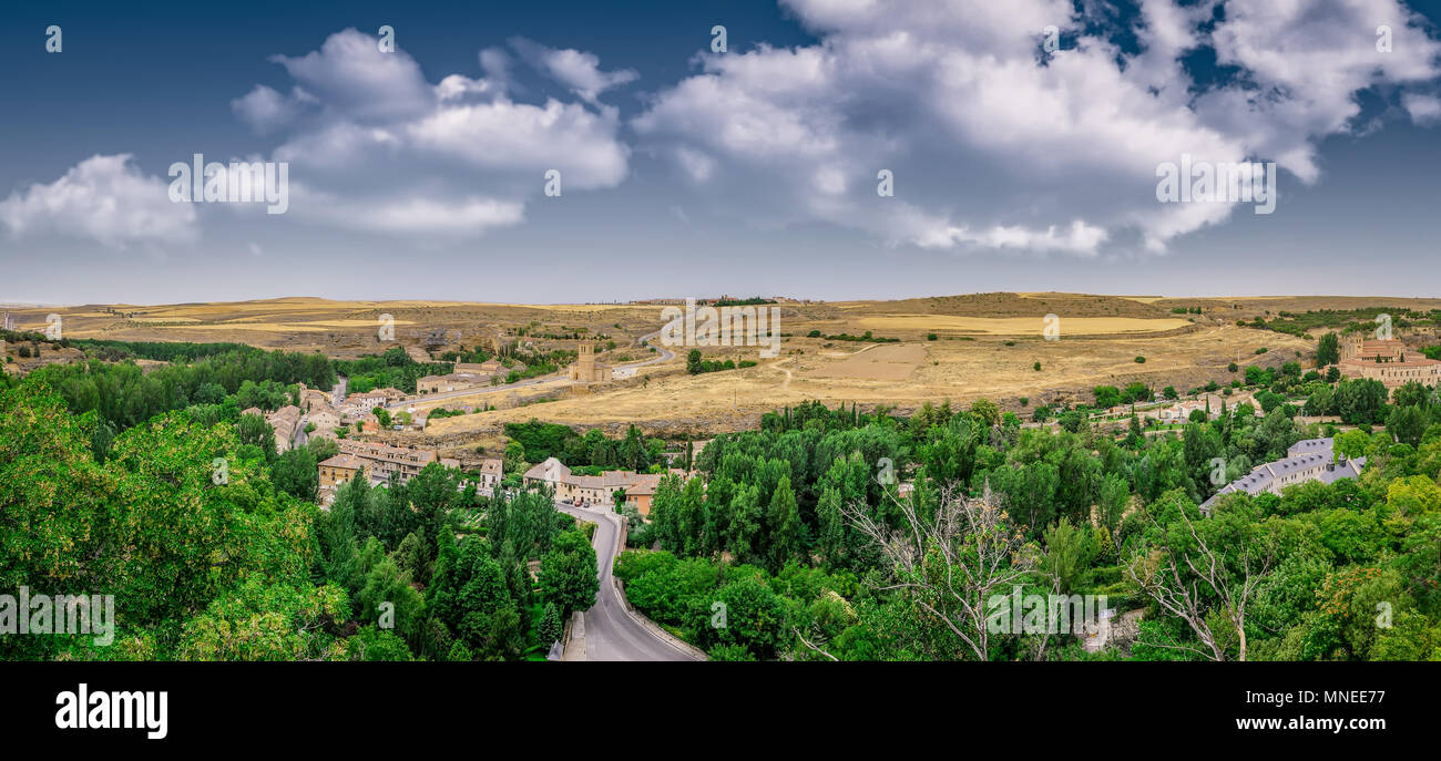 Panoramic view on the twisted rural road on the hill of Segovia city in Spain. Stock Photo
