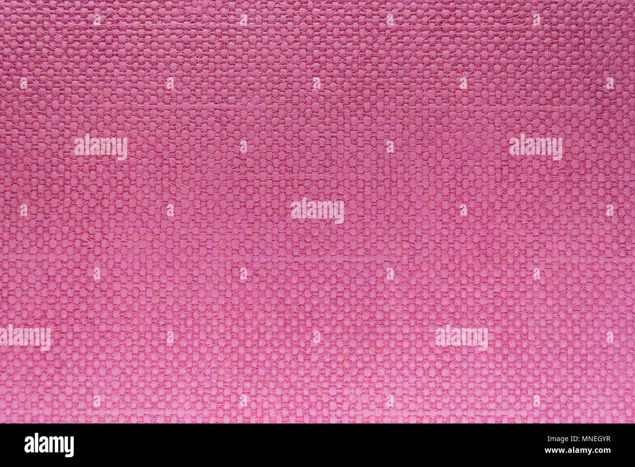 Pink plastic background surface with squares pattern Stock Photo