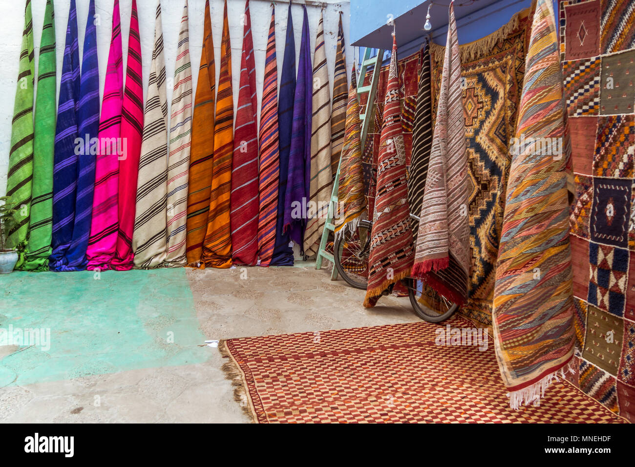 Sale of Moroccan fabrics and carpets Stock Photo Alamy