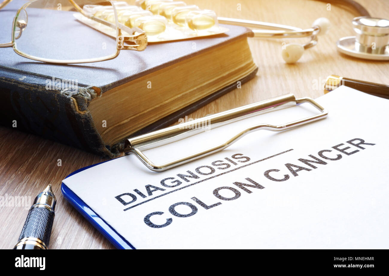 Diagnosis colon cancer and stethoscope on a table. Stock Photo