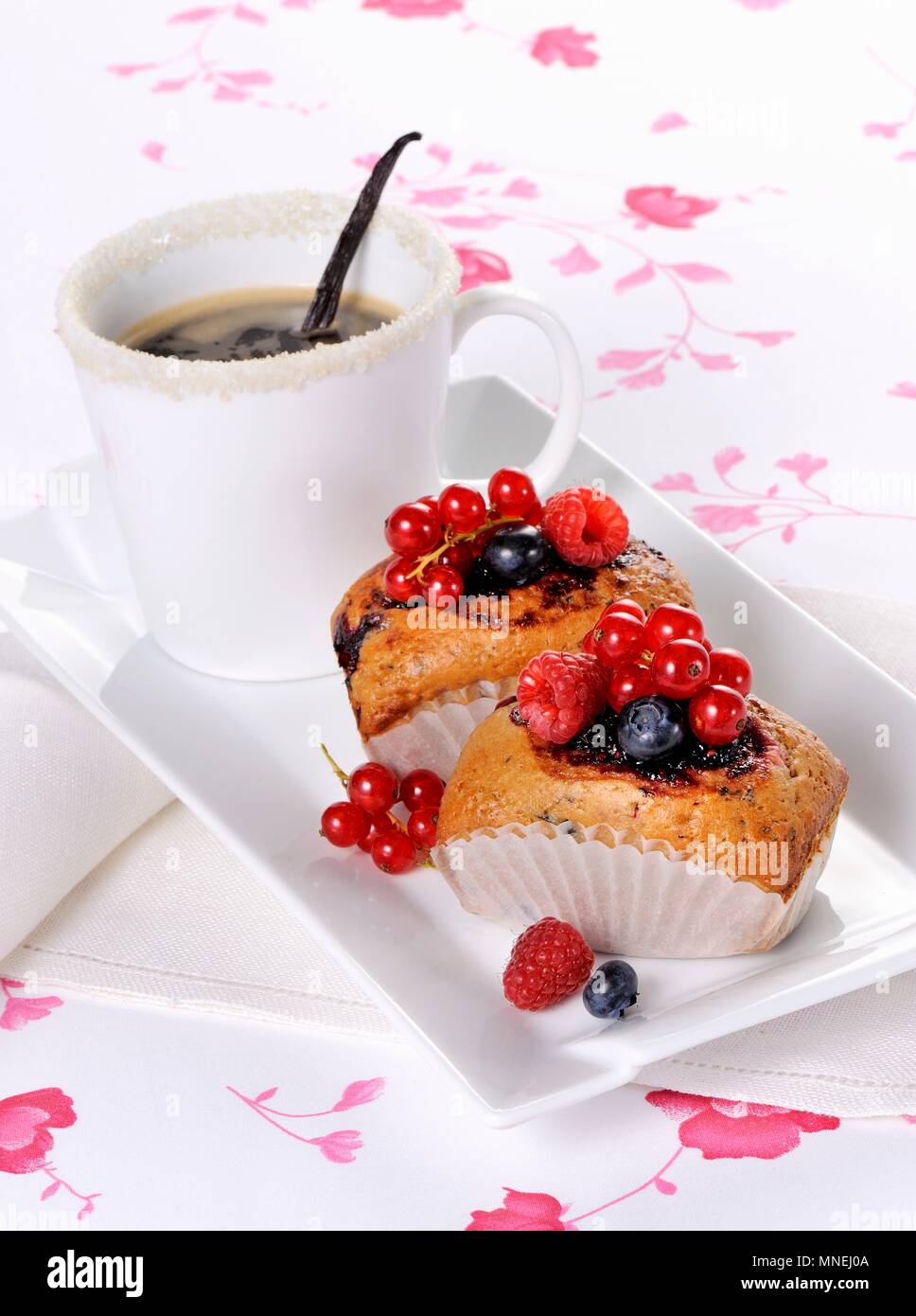 Small berry cakes and coffee Stock Photo