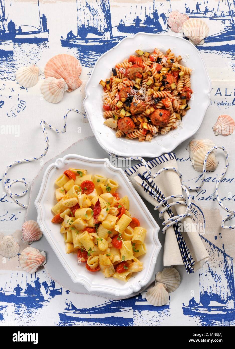 Fusilli with meat dumplings and aubergines, and pasta with potatoes and stock fish Stock Photo