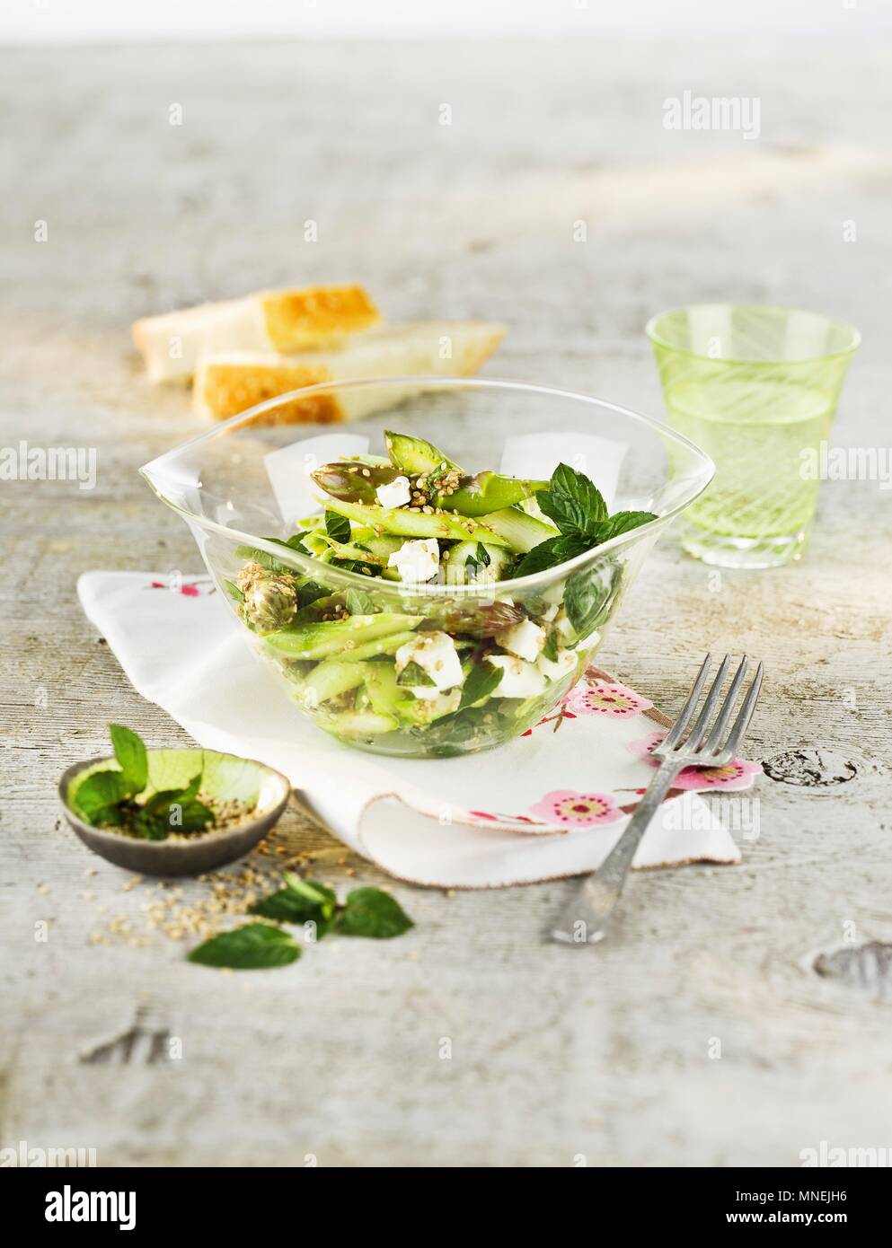 Green asparagus salad with sesame seeds and mint Stock Photo