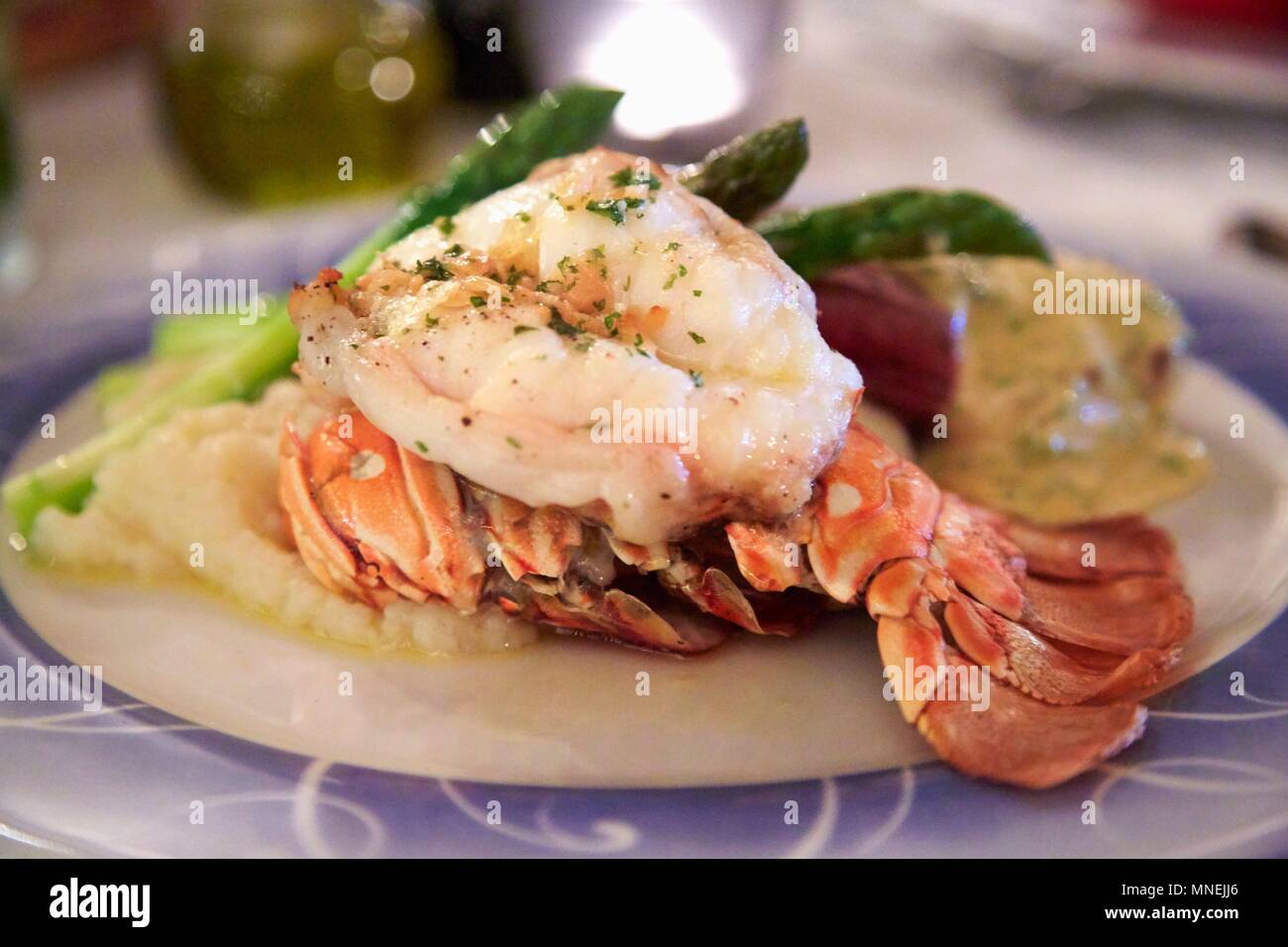 Lobster and steak with asparagus (Costa Rica) Stock Photo