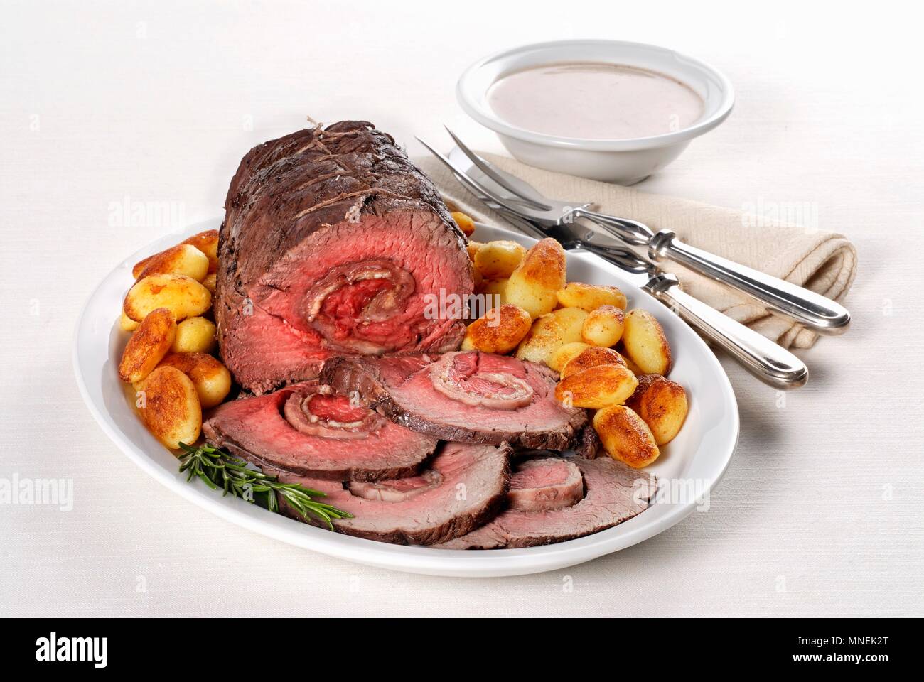 Arrosto rosa di parma (rolled roast beef with a ham filling, Italy) Stock Photo
