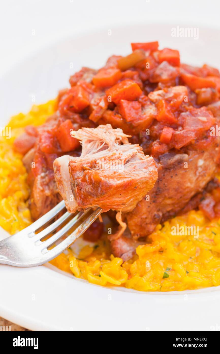 Osso Buco with Risotto alla Milanese (Italy) Stock Photo