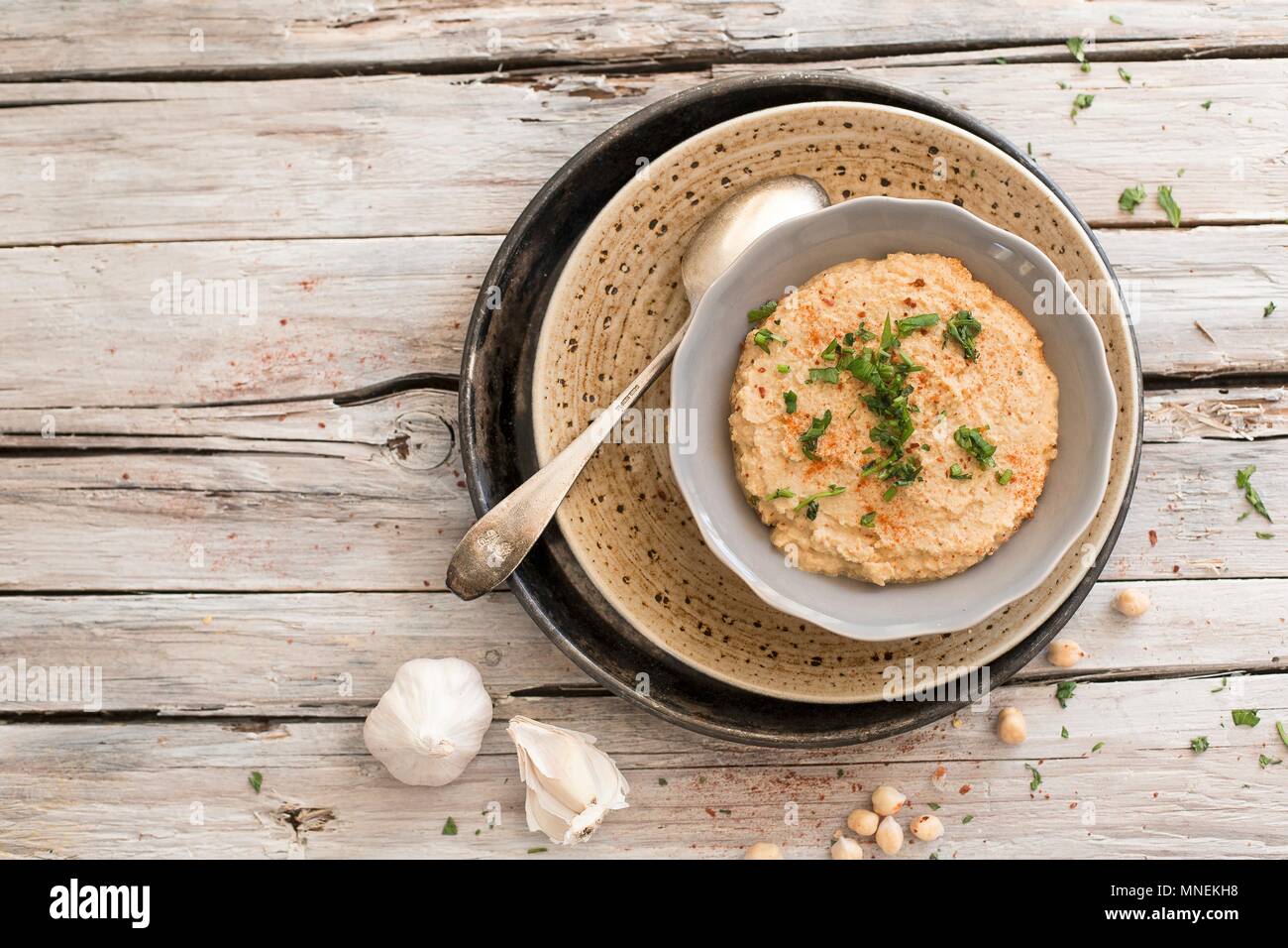 Hummus in a small bowl (view from above) Stock Photo