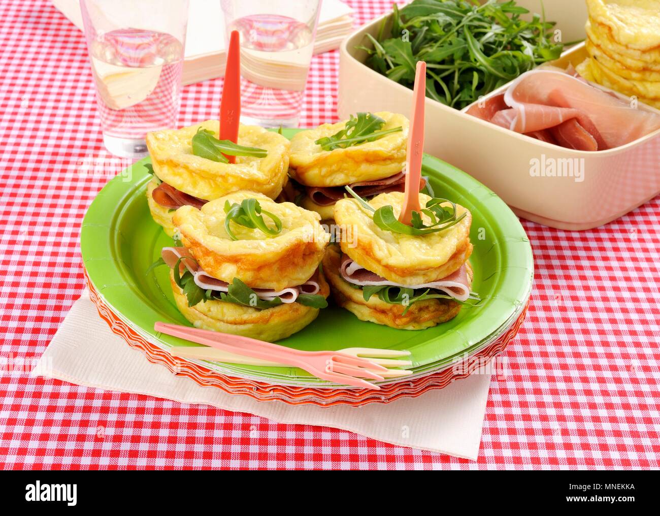 Omelette sandwiches with cured ham and rocket Stock Photo