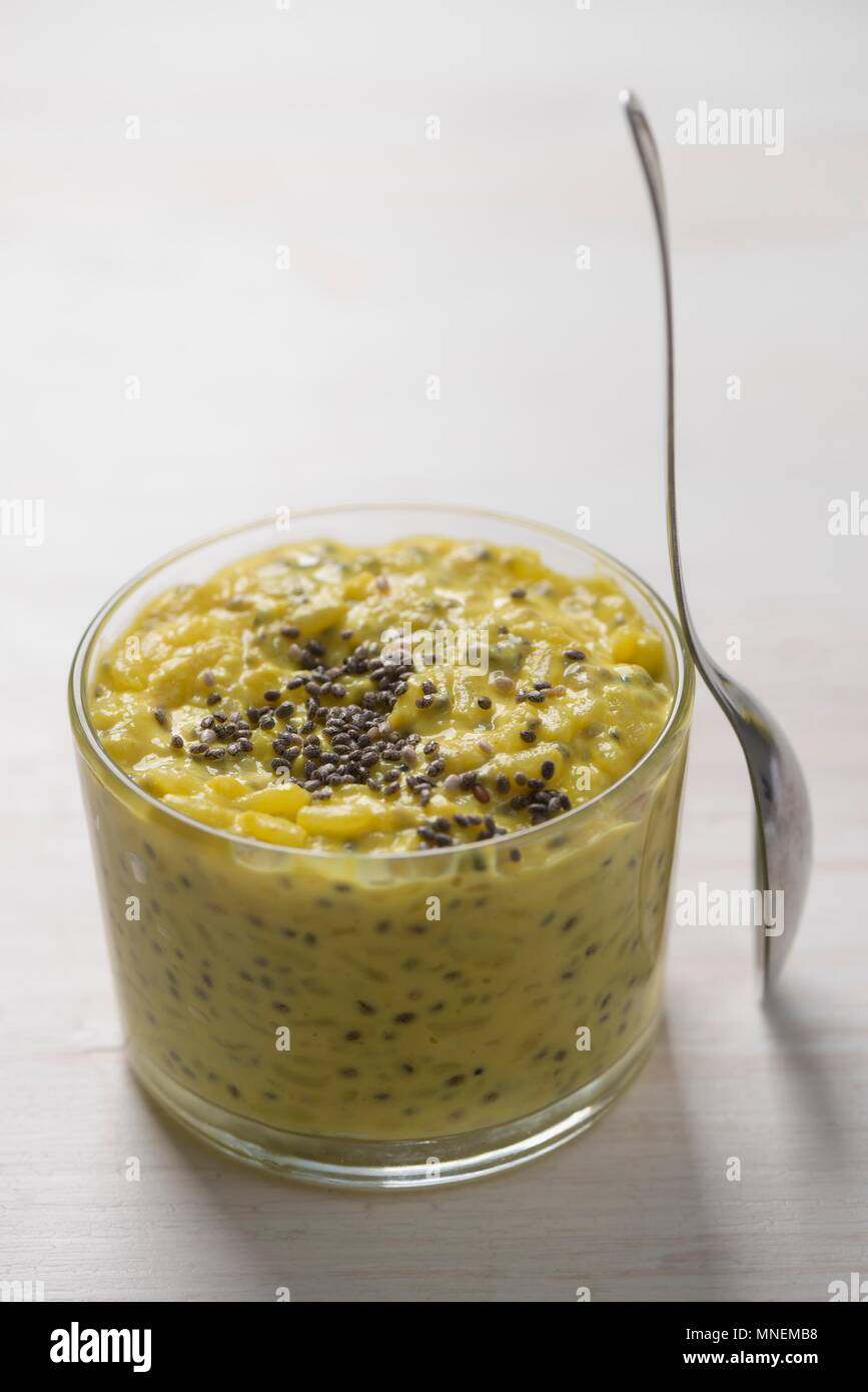 Turmeric rice pudding with chia seeds Stock Photo Alamy