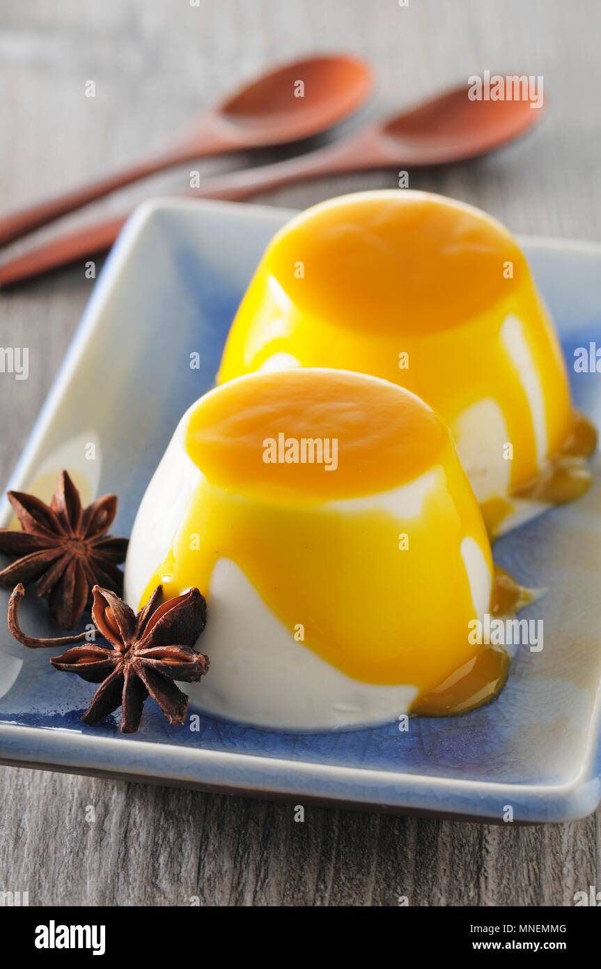 Pannacotta With Mango Sauce Stock Photo Alamy