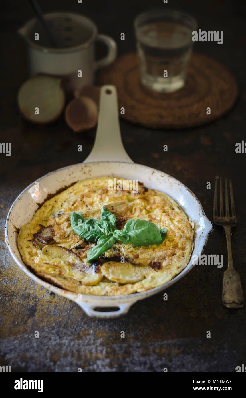 Spanish omelette with potatoes in a pan Stock Photo Alamy