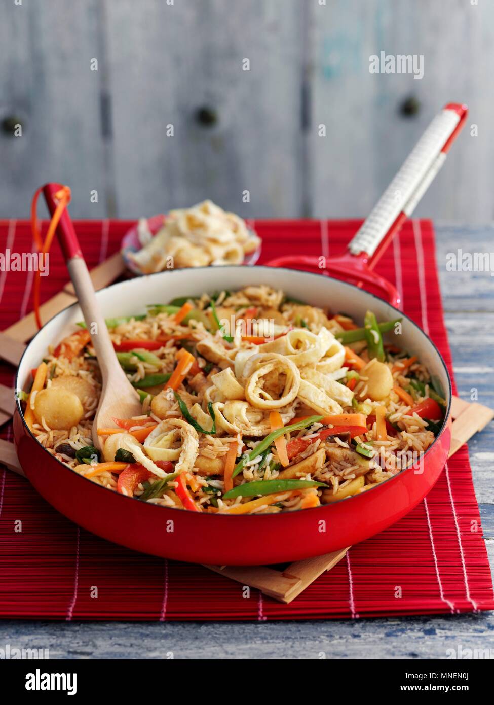 Fried rice with vegetables and pancake strips Stock Photo