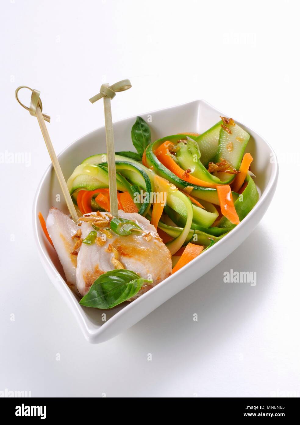 Fish with Thai-style vegetables Stock Photo