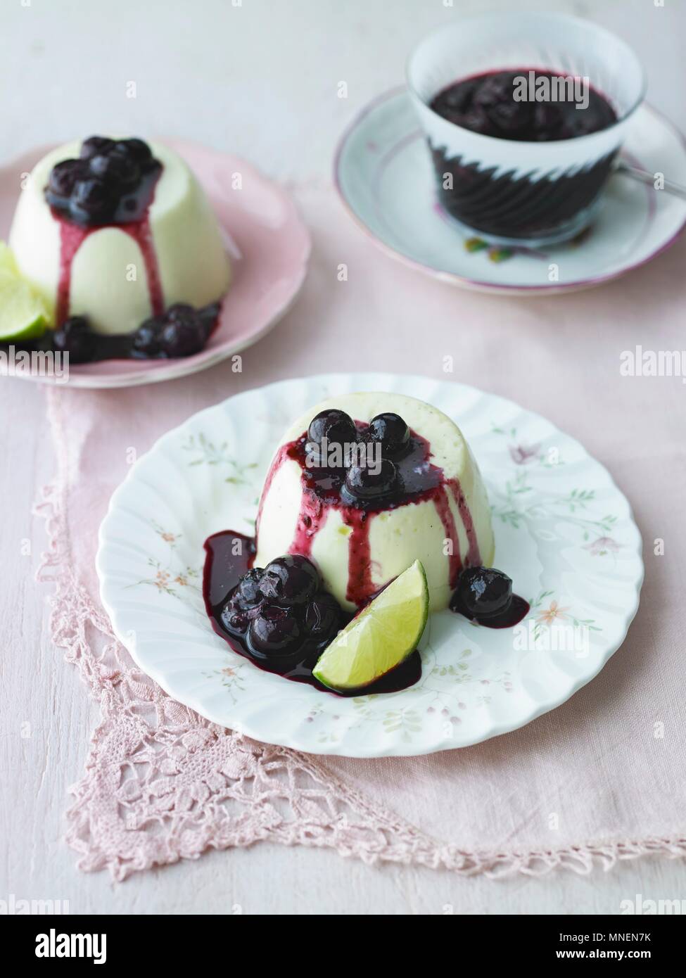 White chocolate panna cotta with blueberry and lime compote Stock Photo