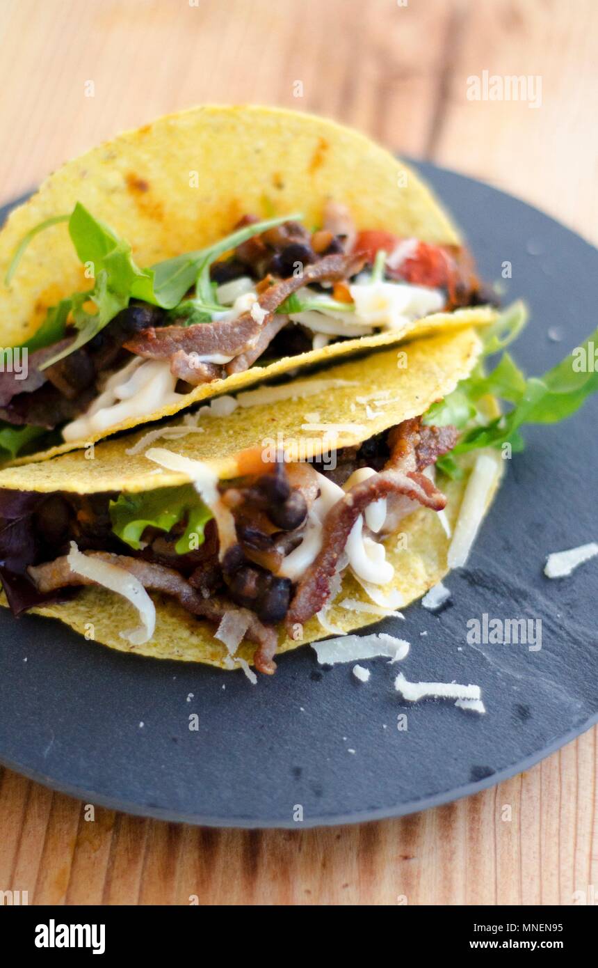 Tacos filled with meat (Mexico Stock Photo Alamy