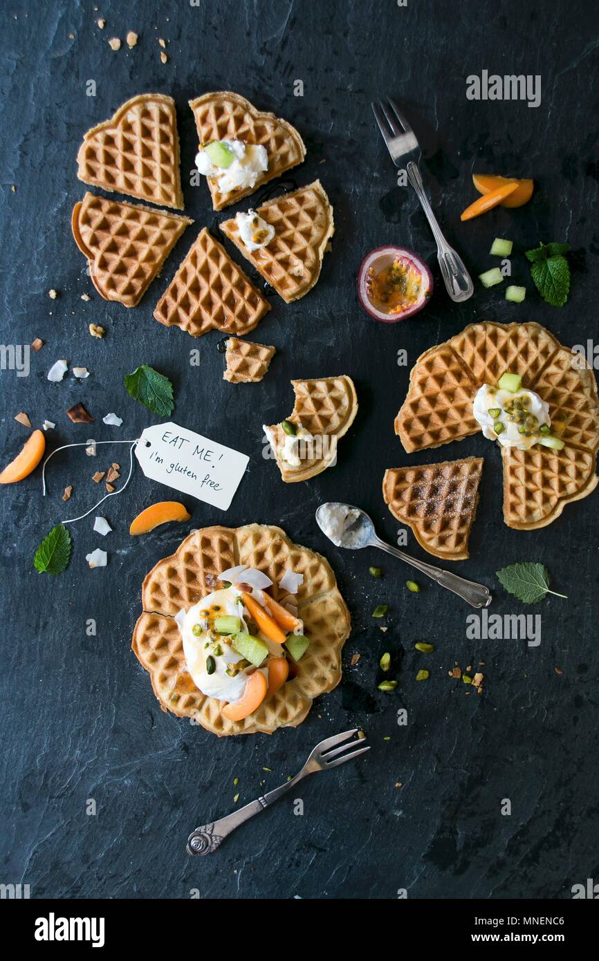Gluten-free waffles with pistachios and fruits Stock Photo