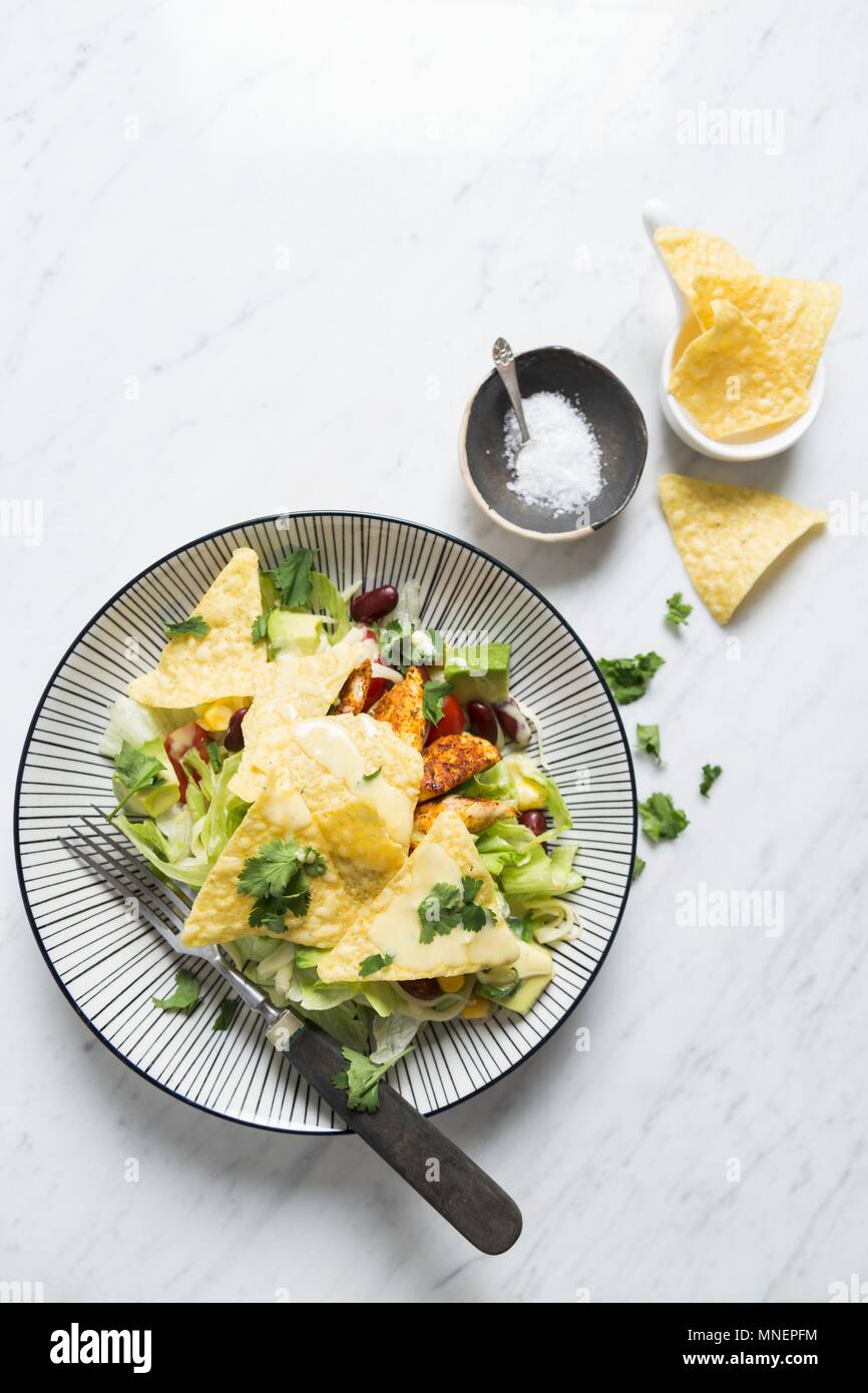 A taco salad with kidney beans and chicken Stock Photo