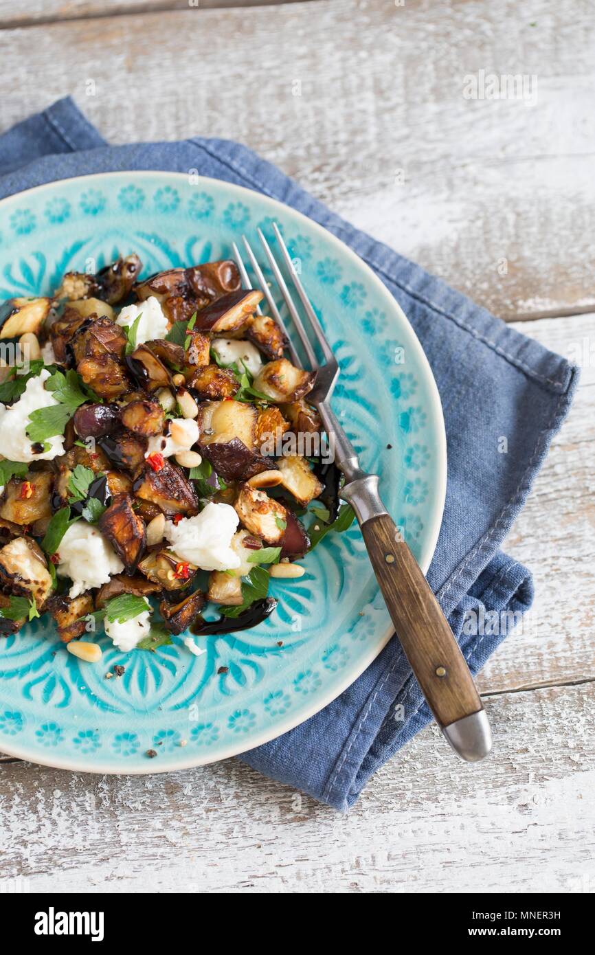 Salad with roasted aubergines, mozzarella, pine nuts and parsley Stock