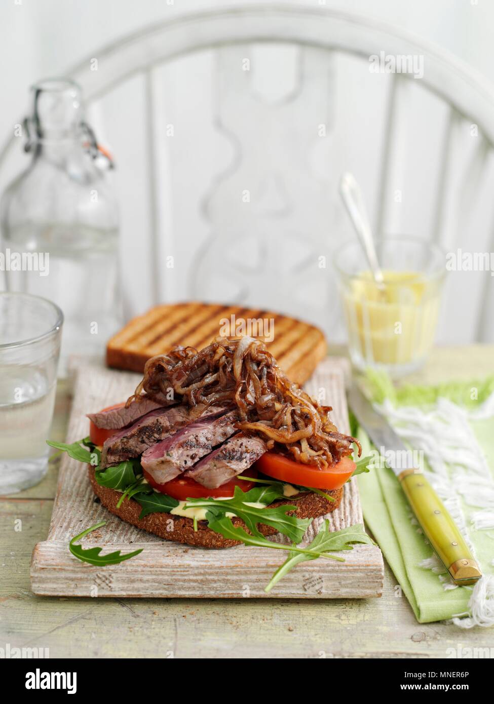 A steak and onion sandwich Stock Photo