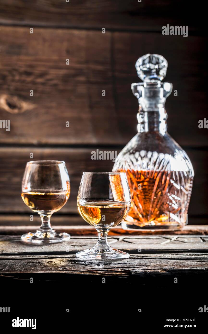 Two glasses of cognac and a carafe Stock Photo