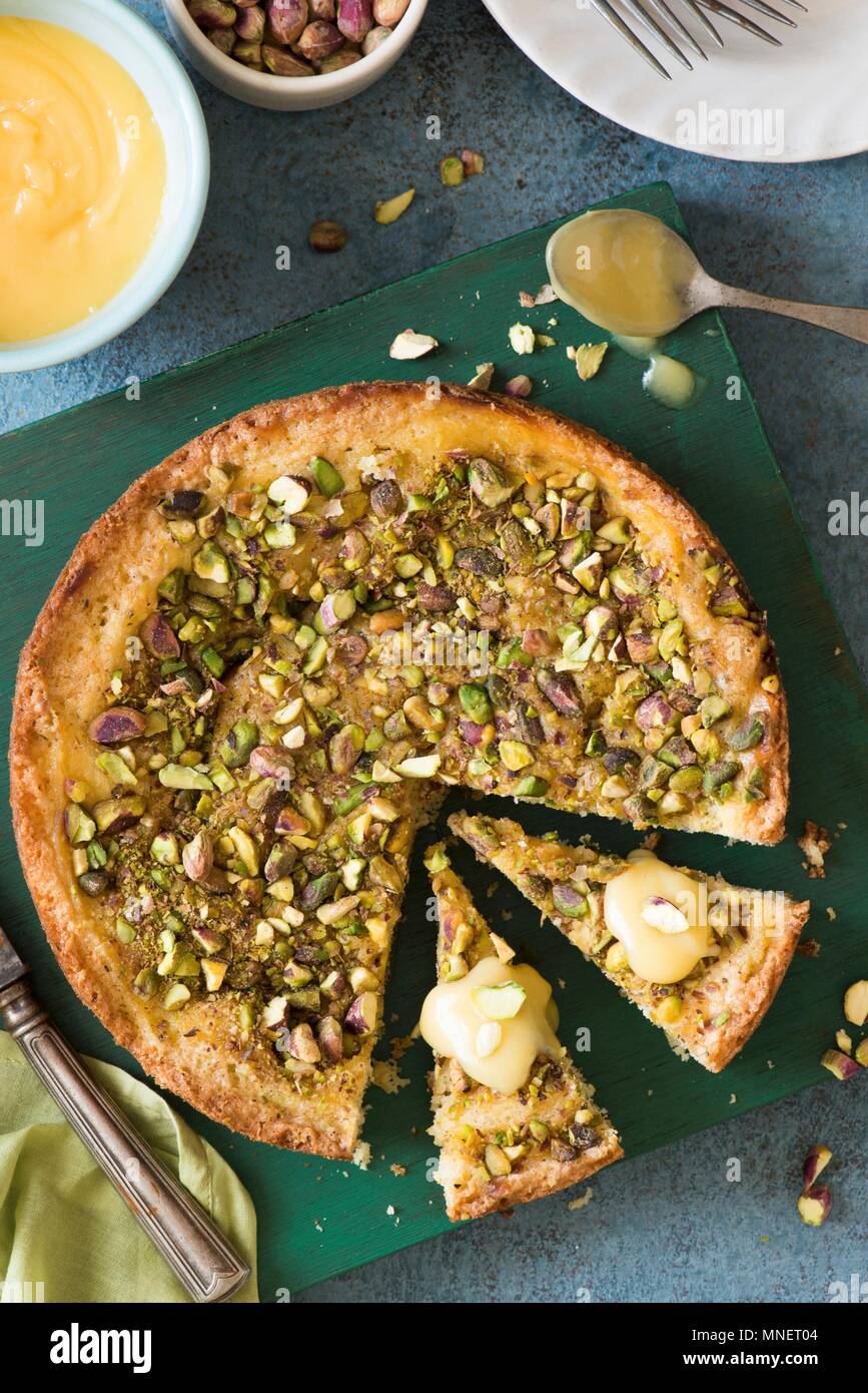 Lemon curd pistachio cake Stock Photo Alamy
