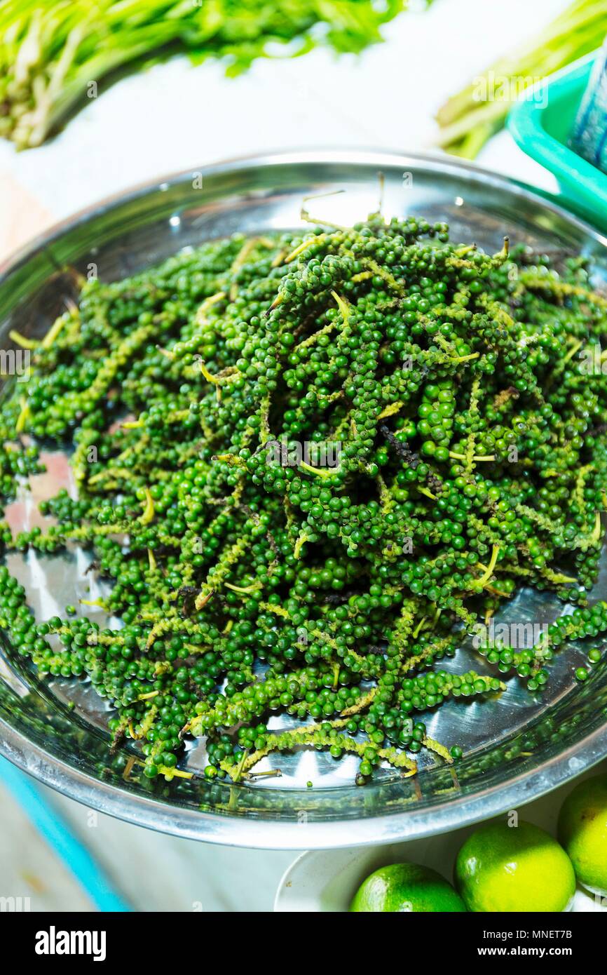 Fresh green peppercorns Stock Photo