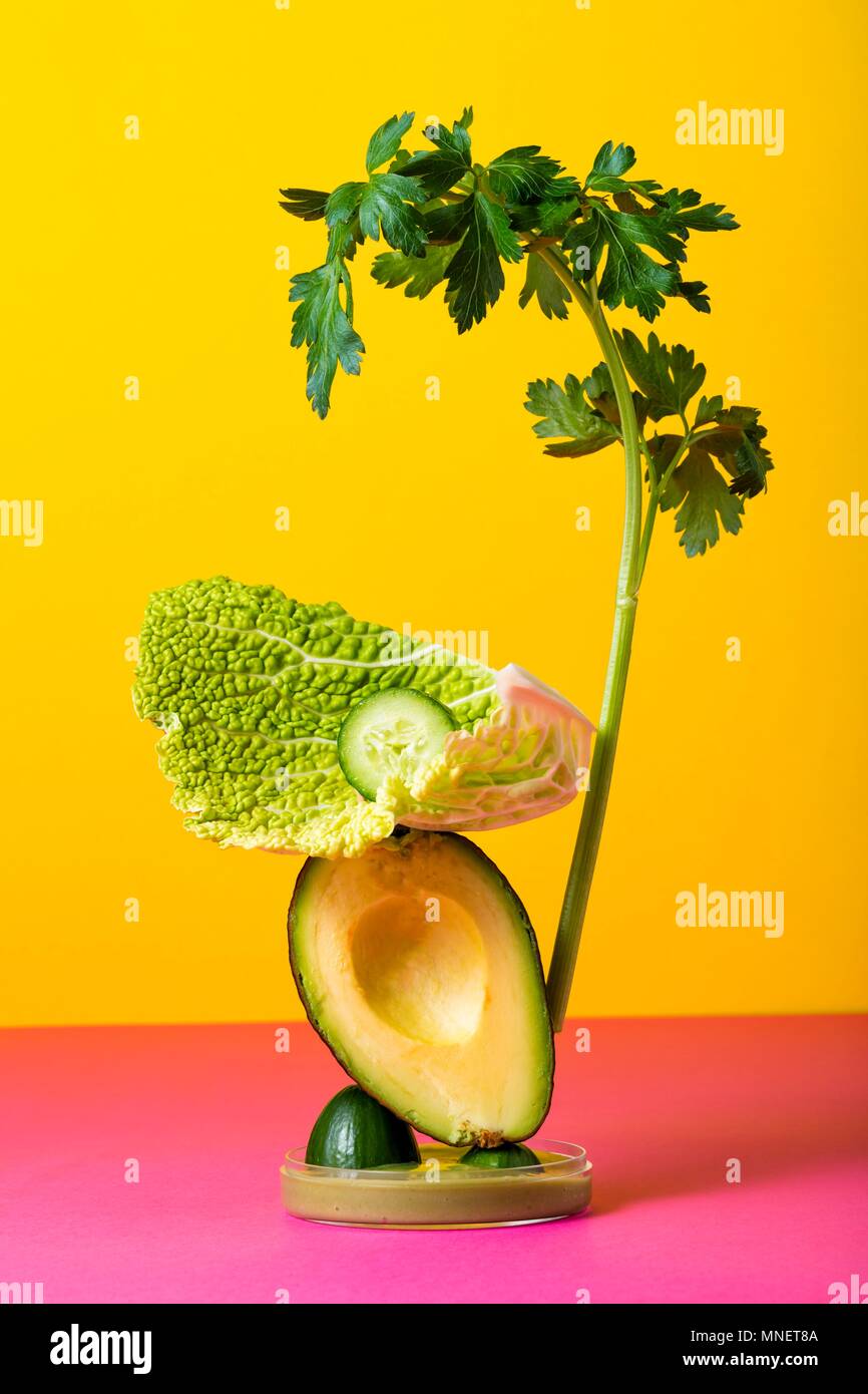 A vegetable sculpture against a coloured background Stock Photo