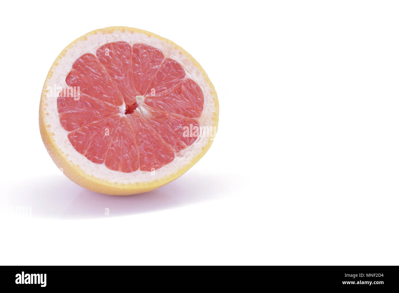 Sliced pink grapefruit isolated on white background Stock Photo