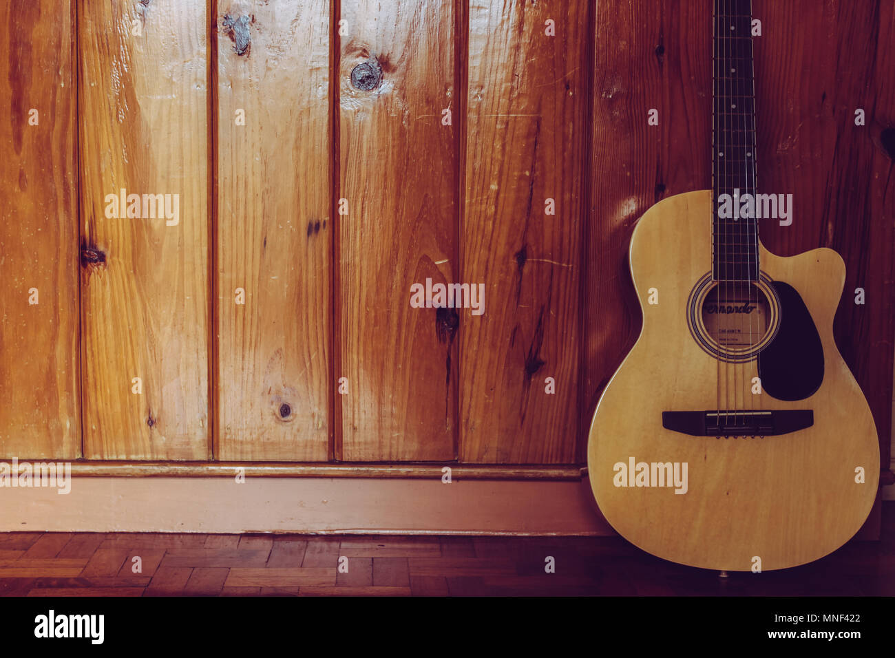 Acoustic Guitar Inside Log Cabinac Stock Photo Alamy