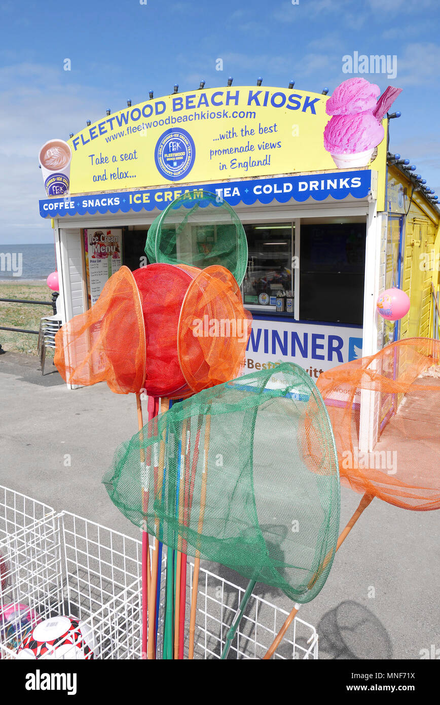 Colourful fishing nets on sale in front of seaside beach kiosk,Fleetwood,Lancashire,UK Stock Photo