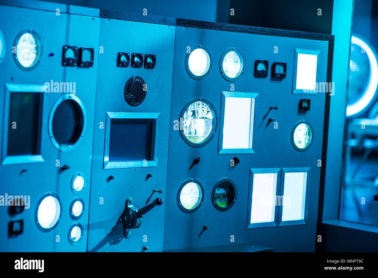 Space rocket lauch Control Center s one of two launch control and monitor panels wih lever arm Stock Photo