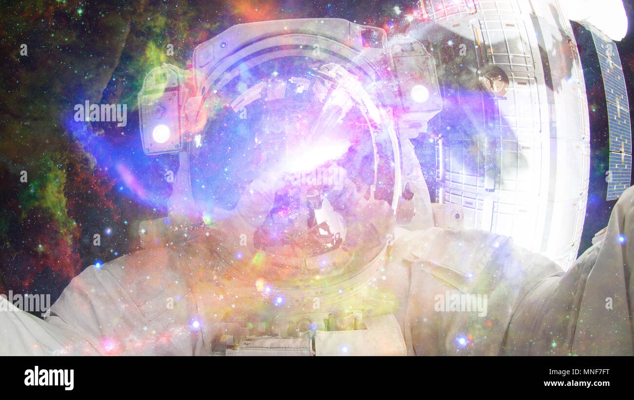 Astronaut in outer space. Science fiction art. Elements of this image ...