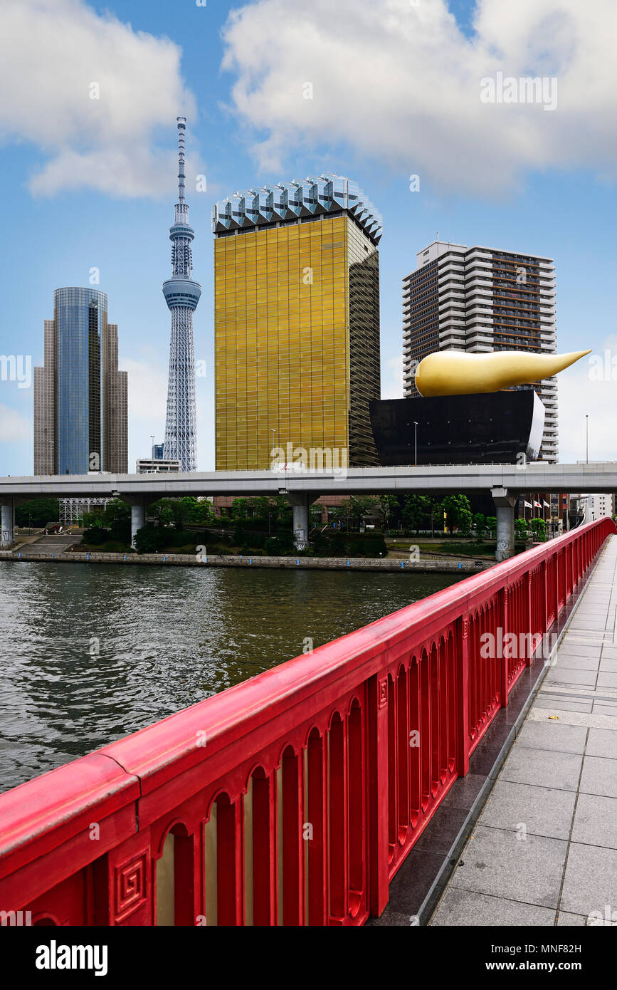 Skytree and the headquarters of the brewery Asahi with Asashi-Flame, Flamme d'Or by Philippe Starck, Tokyo, Japan Stock Photo