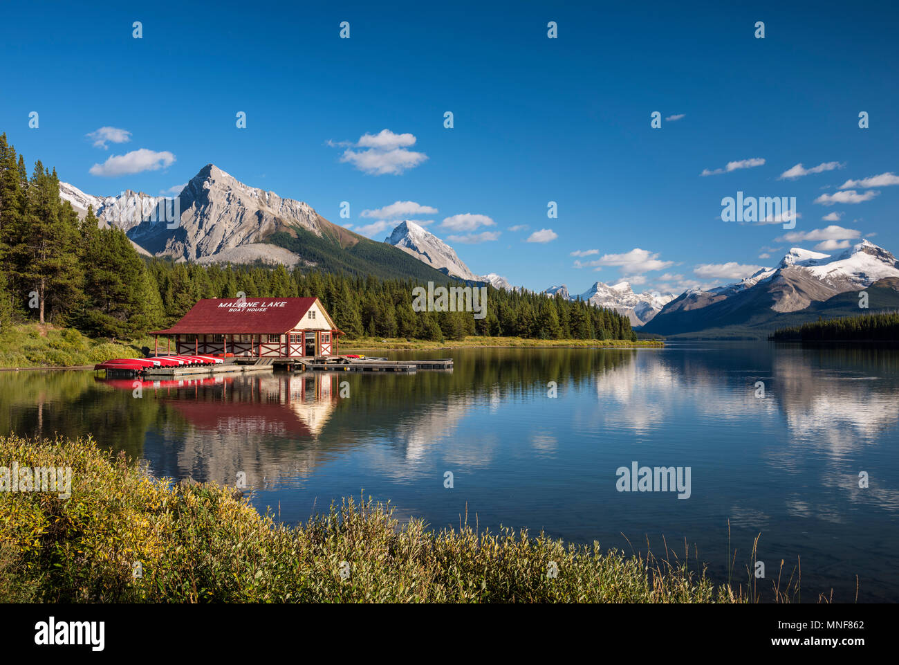 Boathouse with canoes on the shores of Maligne Lake, Jasper National Park, Rocky Mountains, Alberta, Canada Stock Photo