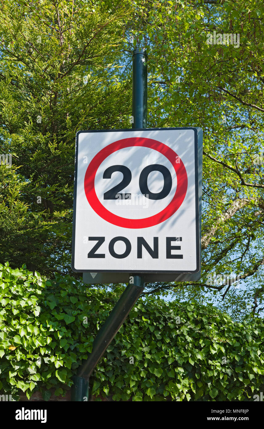 Close up of twenty 20 mph miles per hour zone speed limit restrictions  sign England UK United Kingdom GB Great Britain Stock Photo