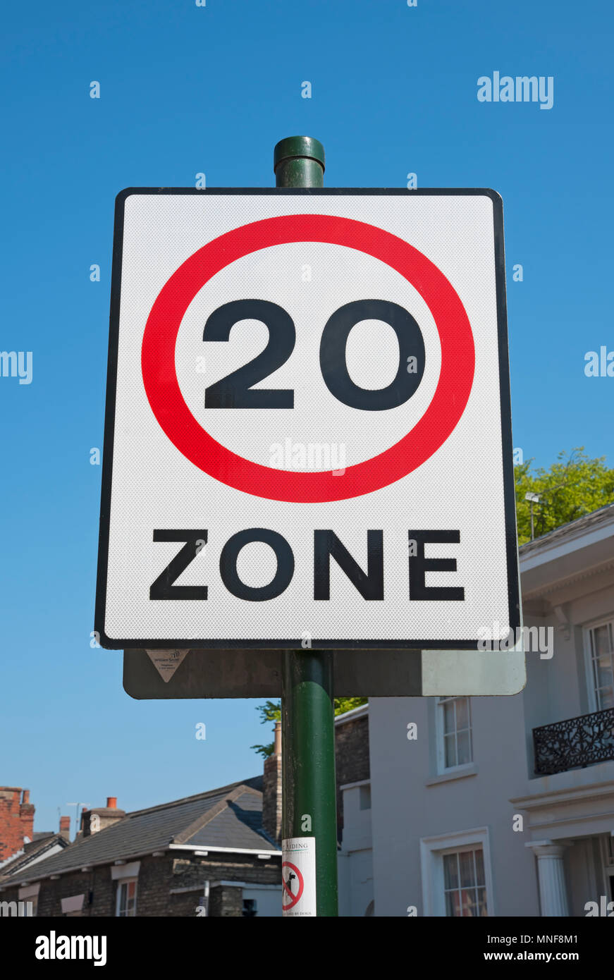 Close up of twenty 20 mph miles per hour speed limit restriction road sign England UK United Kingdom GB Great Britain Stock Photo