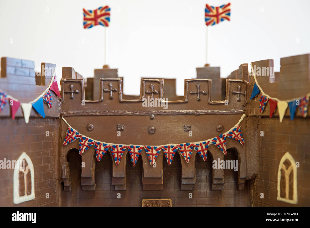 The front of Windsor Castle made entirely out of chocolate at Cadbury World in Birmingham, including the Henry VIII gate with a hand-piped picture of St George's Chapel visible through it, ahead of the royal wedding this weekend. Stock Photo