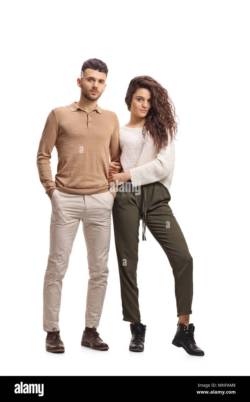 Full length portrait of a young couple isolated on white background ...