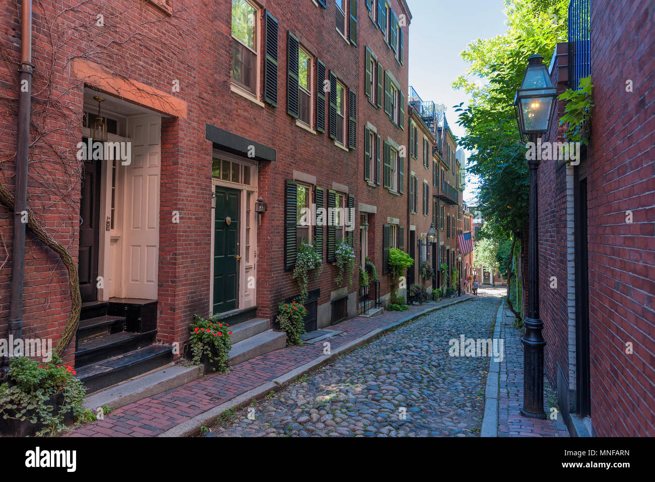 Boston, Massachusetts, USA - September 12, 2016: Acorn Street on Beacon Hill in Boston, Massachusetts.  It's narrow cobblestone street lined with narr Stock Photo