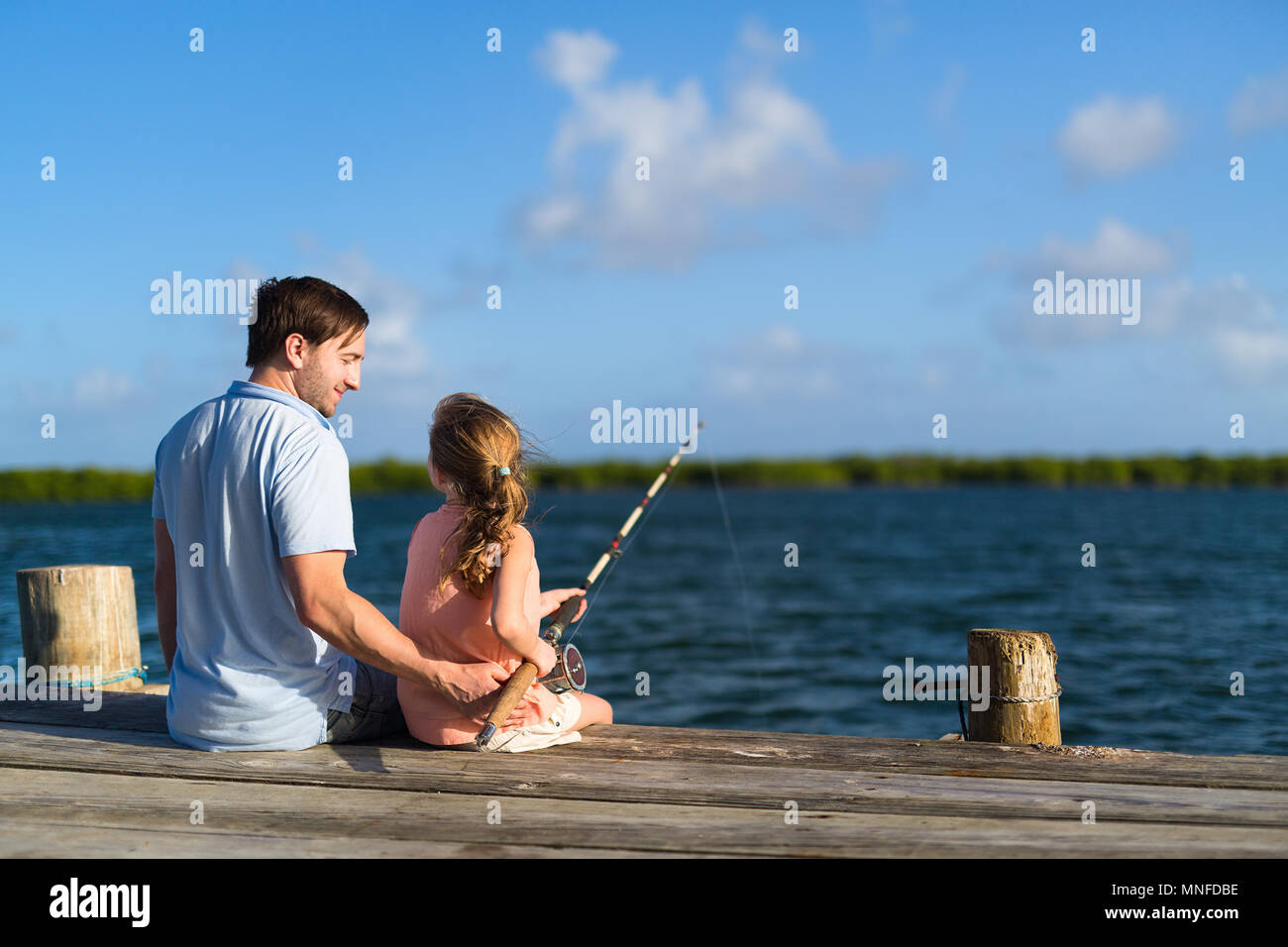 Dad and daughter fishing hi-res stock photography and images - Alamy
