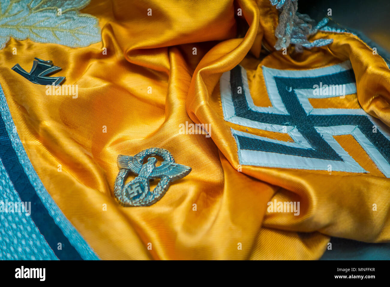 BELARUS, MINSK - MAY 01, 2018: Close up of Hakenkreuz swastika nazi sign over a yellow brand inside of State Museum of the Great Patriotic War of the museum in Minsk Stock Photo