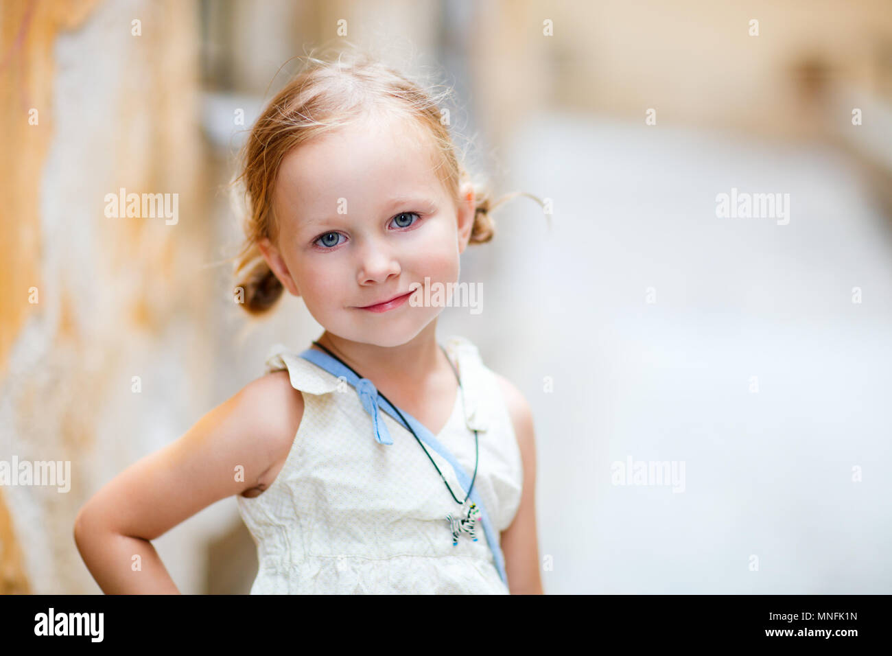 Portrait of adorable little girl outdoors Stock Photo - Alamy