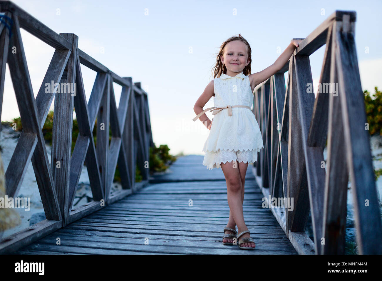 Portrait of adorable little girl outdoors Stock Photo - Alamy