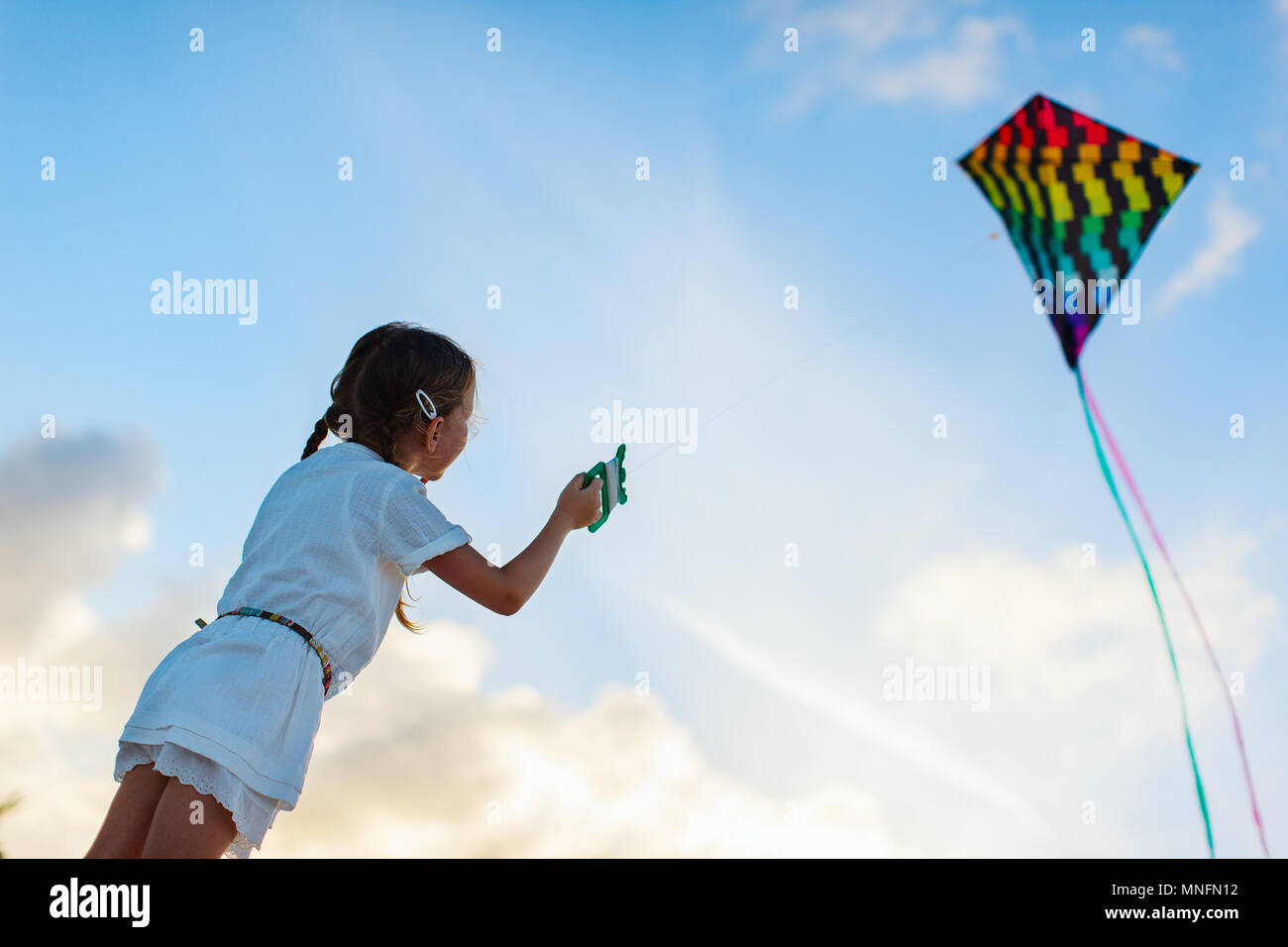 Girl Flying A Kite Stock Photos Girl Flying A Kite Stock Images