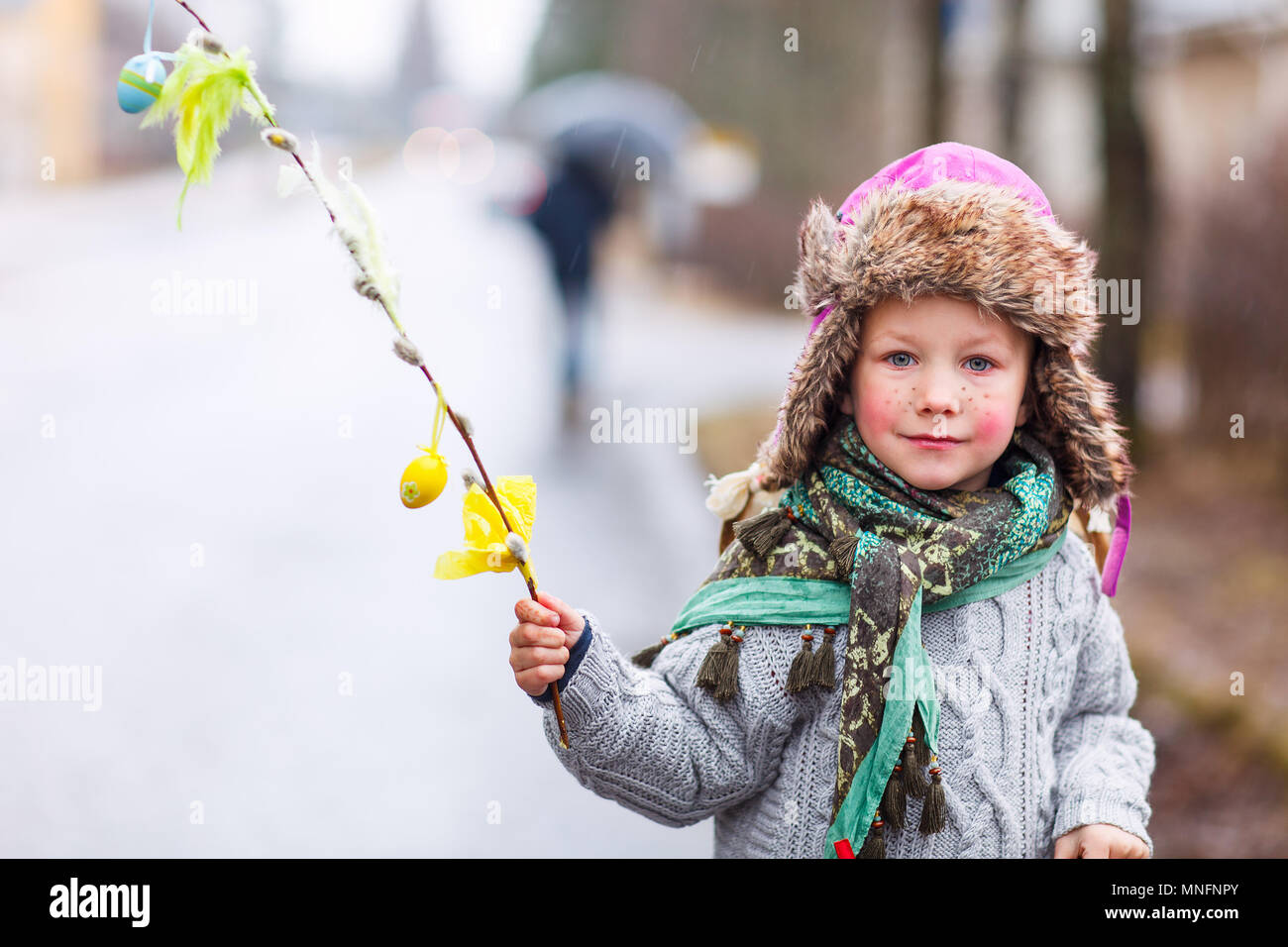 Adorable little girl outdoors dressed for Easter traditional celebration in  Finland Stock Photo - Alamy