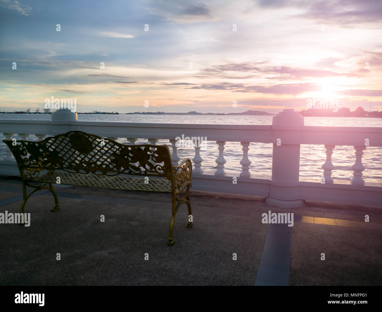Lonely Riverside the lonely chair and sunset at the riverside, sunlight landscape ...