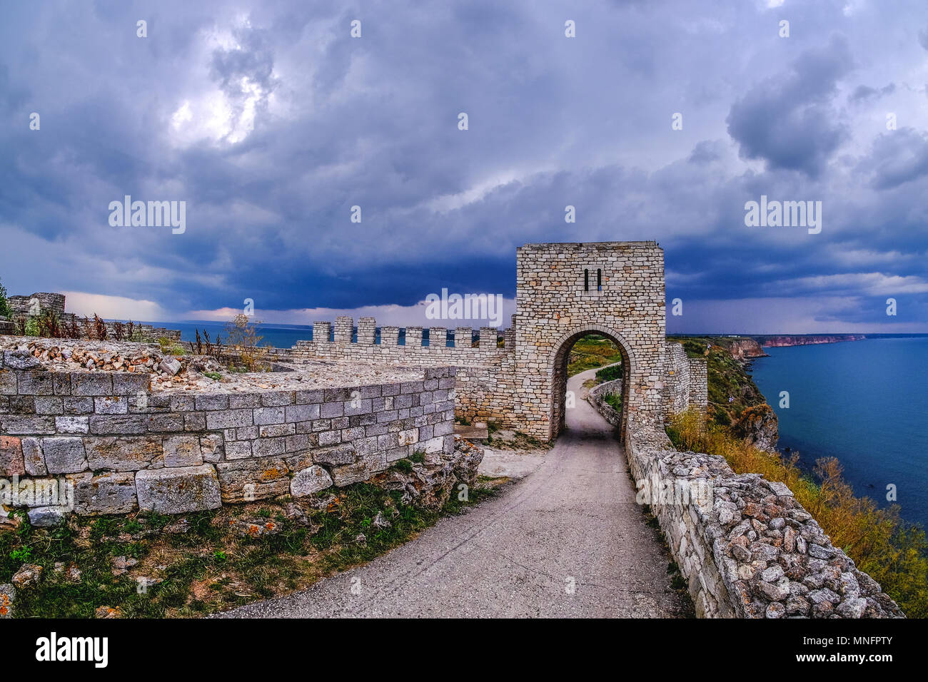 Cape Kaliakra, Bulgaria, dramatic storm comming at Black Sea. Old abandoned fortress by the sea. Important trousitic attraction. Stock Photo