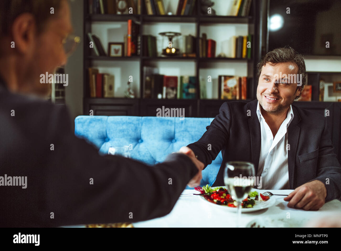 Businesspeople having business lunch Stock Photo