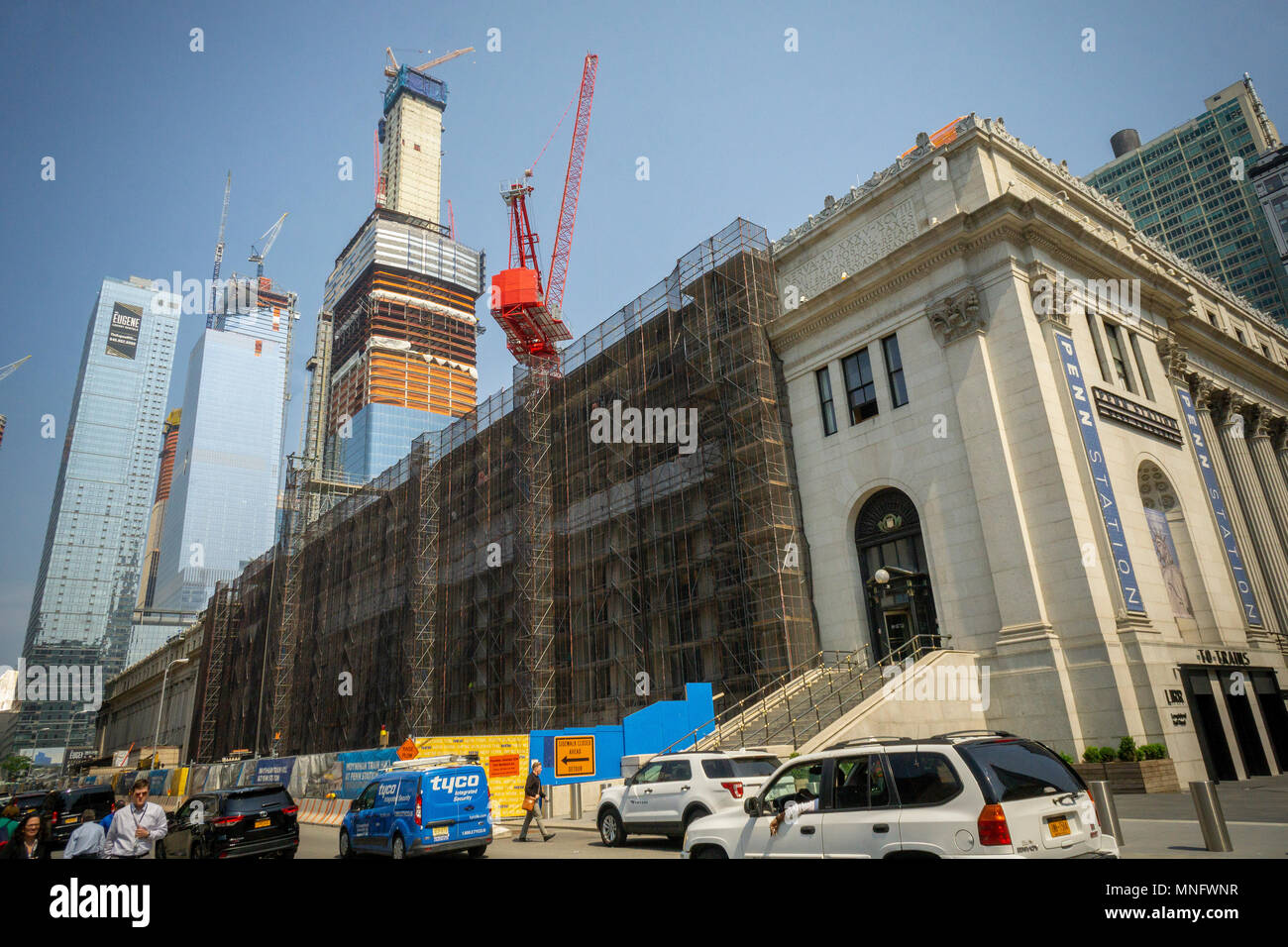 The James Farley Post Office in New York, soon to be the Moynihan Station, with the Hudson Yards development towering over it on Tuesday, May 15, 2018. (Â© Richard B. Levine) Stock Photo